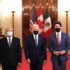 Tổng thống Mexico Lopez Obrador (trái), Tổng thống Mỹ Joe Biden (giữa) và Thủ tướng Canada Justin Trudeau tại Hội nghị thượng đỉnh ba bên ở Washington DC., ngày 18/11. (Ảnh: AFP/TTXVN)