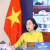 Tổng giám đốc TTXVN Vũ Việt Trang phát biểu với chủ đề "Trên tinh thần khoa học và hợp tác: Phản ứng của truyền thông trong các sự kiện khẩn cấp về sức khỏe cộng đồng" tại điểm cầu Hà Nội. (Ảnh: Văn Điệp/TTXVN)