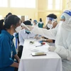 [Photo] Nghệ An tiêm vaccine phòng COVID-19 cho trẻ từ 12-17 tuổi