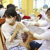 [Photo] Vĩnh Phúc tiêm vaccine phòng COVID-19 cho trẻ từ 12-17 tuổi