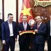 Chủ tịch nước tiếp huấn luyện viên của hai đội tuyển bóng đá Việt Nam