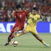 Bóng đá Việt Nam và Thái Lan nhiều lần đối đầu nhau trong năm 2022 ở nhiều cấp độ đội tuyển khác nhau. (Ảnh: TTXVN) 