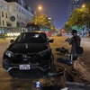Ôtô gây tai nạn liên hoàn rồi bỏ chạy trên phố Nguyễn Chánh. (Ảnh: Phạm Kiên/TTXVN)