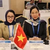 Tổng giám đốc TTXVN Vũ Việt Trang (bên phải) dẫn đầu đoàn Việt Nam tham dự Đại hội đồng OANA lần thứ 18. (Ảnh: TTXVN phát)