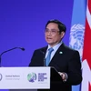 Thủ tướng Phạm Minh Chính phát biểu tại Hội nghị Thượng đỉnh khí hậu trong khuôn khổ Hội nghị lần thứ 26 các Bên tham gia Công ước khung của Liên hợp quốc về Biến đổi khí hậu (COP26). (Ảnh: Dương Giang/TTXVN)