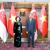 Bà Trương Thị Mai hội kiến với Bộ trưởng Ngoại giao Singapore Vivian Balakrishnan. (Ảnh: Lê Dương/TTXVN) 