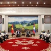 Tổng Bí thư, Chủ tịch nước Lào tiếp đoàn đại biểu ĐCS Việt Nam