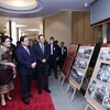 Thủ tướng CHDCND Lào chiêu đãi Thủ tướng và đoàn cấp cao Việt Nam