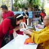 Lễ chùa đầu năm, nét văn hóa của cộng đồng người Việt tại Lào