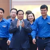 Thủ tướng Phạm Minh Chính và các đại biểu đến dự hội nghị. (Ảnh: Dương Giang/TTXVN)