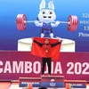 Nguyễn Quốc Toàn phá kỷ lục SEA Games, giành HCV môn Cử tạ hạng 89kg nam. (Ảnh: Minh Quyết/TTXVN)