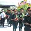 Truy điệu và an táng 16 hài cốt liệt sỹ Việt Nam hy sinh tại Lào