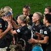 Niềm vui của cầu thủ New Zealand sau bàn thắng của Hannah Wilkinson. (Ảnh: AFP/TTXVN)