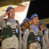 Đội Công binh số 1 thực hiện nghi lễ chào cờ tại Sân bay quốc tế Nội Bài. (Ảnh: An Đăng/TTXVN)