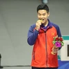Xạ thủ Phạm Quang Huy giành HCV đầu tiên cho Đoàn Thể thao Việt Nam ở ASIAD 19. (Ảnh: TTXVN phát)
