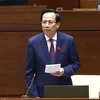 Bộ trưởng Bộ Lao động-Thương binh và Xã hội Đào Ngọc Dung phát biểu giải trình, làm rõ một số vấn đề đại biểu Quốc hội nêu. (Ảnh: Doãn Tấn/TTXVN)