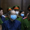 Bị cáo Nguyễn Minh Quân (cựu Giám đốc Bệnh viện thành phố Thủ Đức), bị xét xử về 2 tội "tham ô tài sản" và "rửa tiền." (Ảnh: Thành Chung/TTXVN)