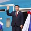 Chủ tịch Quốc hội Vương Đình Huệ đến sân bay quốc tế Wattay, thủ đô Vientiane. (Ảnh: Doãn Tấn/TTXVN)