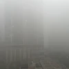 Thủ đô Hà Nội xuất hiện sương mù dày vào sáng sớm 7/12. (Ảnh: Vietnam+)