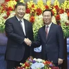 Chủ tịch nước Võ Văn Thưởng và Tổng Bí thư, Chủ tịch nước Trung Quốc Tập Cận Bình chụp ảnh chung. (Ảnh: Thống Nhất/TTXVN)