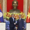 Chủ tịch nước Võ Văn Thưởng tiếp Thủ tướng Lào Sonexay Siphandone. (Ảnh: Thống Nhất/TTXVN)
