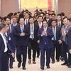 Thủ tướng Việt Nam và Lào dự Hội nghị hợp tác đầu tư giữa hai nước