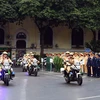 Lực lượng cảnh sát Giao thông diễu hành tại lễ ra quân Năm An toàn giao thông 2024. (Ảnh: Huy Hùng/TTXVN)