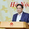 Thủ tướng Phạm Minh Chính phát biểu tại buổi làm việc với Ủy ban Quản lý vốn Nhà nước tại doanh nghiệp và 19 tập đoàn, tổng công ty. (Ảnh: Dương Giang/TTXVN)