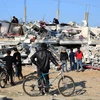Một tòa nhà bị phá hủy sau cuộc không kích của Israel tại Rafah, Dải Gaza, ngày 26/2. (Ảnh: THX/TTXVN)