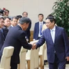 Thủ tướng Phạm Minh Chính tiếp Đoàn đại biểu Ủy ban Kinh tế Nhật-Việt. (Ảnh: Dương Giang/TTXVN)
