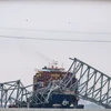 Tàu chở hàng Dali đâm sập cầu Francis Scott Key ở thành phố Baltimore, bang Maryland, Mỹ. (Ảnh: AFP/TTXVN)