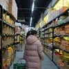 Người dân đi mua sắm tại một siêu thị ở Hàn Quốc. (Nguồn: 