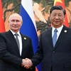 Chủ tịch Trung Quốc Tập Cận Bình (phải) và Tổng thống Nga Vladimir Putin tại cuộc hội đàm ở Bắc Kinh, Trung Quốc, ngày 18/10/2023. (Ảnh: AFP/TTXVN)