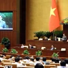 Phó Chủ tịch Quốc hội Nguyễn Khắc Định điều hành phiên họp. (Ảnh: An Đăng/TTXVN)