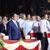 Thủ tướng Phạm Minh Chính và các đại biểu dự Lễ kỷ niệm 420 năm hình thành tỉnh Quảng Bình, 75 năm ngày Quảng Bình quật khởi và 35 năm ngày tái lập tỉnh. (Ảnh: Dương Giang/TTXVN)
