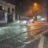 Nước ngập trên phố Đội Cấn, Hà Nội. (Ảnh minh họa: Mạnh Khánh/TTXVN)
