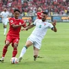 Indonesia (áo đỏ) để thua Iraq trên sân nhà. (Nguồn: Bola)
