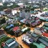 Mưa lũ đã khiến nhiều tuyến đường và hàng nghìn ngôi nhà ở thành phố Hà Giang bị ngập chìm trong nước. (Ảnh: TTXVN phát)