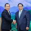 Thủ tướng Phạm Minh Chính tiếp Bộ trưởng Thanh tra Campuchia Hout Hak. (Ảnh: Dương Giang/TTXVN)