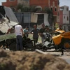 Phương tiện bị phá hủy sau cuộc tấn công của Israel vào trại tị nạn Nuseirat ở Dải Gaza ngày 8/6/2024. (Ảnh: THX/TTXVN)