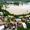 Cảnh ngập lụt sau những trận mưa lớn tại Nam Sulawesi, Indonesia. (Ảnh: THX/TTXVN)