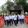 Chủ tịch nước Tô Lâm thăm làng cổ Đường Lâm. (Ảnh: Nhan Sáng/TTXVN)