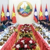 Chủ tịch nước Tô Lâm hội kiến Thủ tướng Lào Sonexay Siphandone. (Ảnh: Nhan Sáng/TTXVN)