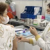 Nhiều người dân tìm đến Viện Pasteur Thành phố Hồ Chí Minh tiêm vaccine phòng bệnh bạch hầu. (Ảnh: Đinh Hằng/TTXVN)