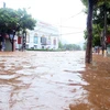 Trục Quốc lộ 6 qua đường Trường Chinh, thành phố Sơn La bị ngập úng gây ảnh hưởng đến sinh hoạt và đi lại của người dân. (Ảnh: Quang Quyết/TTXVN)