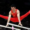 Zou Jingyuan đã xuất sắc bảo vệ thành công tấm huy chương vàng nội dung xà kép. (Nguồn: Olympic Paris)