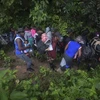 Người di cư băng qua rừng Darien Gap gần Choco (Colombia) để vào Panama. (Ảnh: AFP/TTXVN)