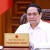 Thủ tướng Phạm Minh Chính chủ trì họp Thường trực Chính phủ để thảo luận về một số luật trình Quốc hội. (Ảnh: Dương Giang/TTXVN)