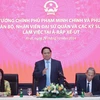 Thủ tướng Phạm Minh Chính và Phu nhân gặp cán bộ, nhân viên Đại sứ quán Việt Nam và các kỹ sư đang làm việc tại Saudi Arabia. (Ảnh: Dương Giang/TTXVN)