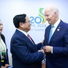 Thủ tướng Phạm Minh Chính gặp Tổng thống Hoa Kỳ Joe Biden tại Hội nghị thượng đỉnh G20. (Ảnh: Dương Giang/TTXVN)